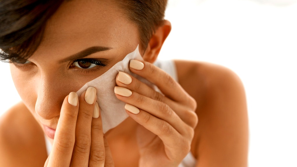 Wedding Makeup - Woman Using Oil Blotting Wipe