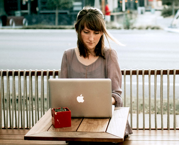 Woman Working Outside On Laptop